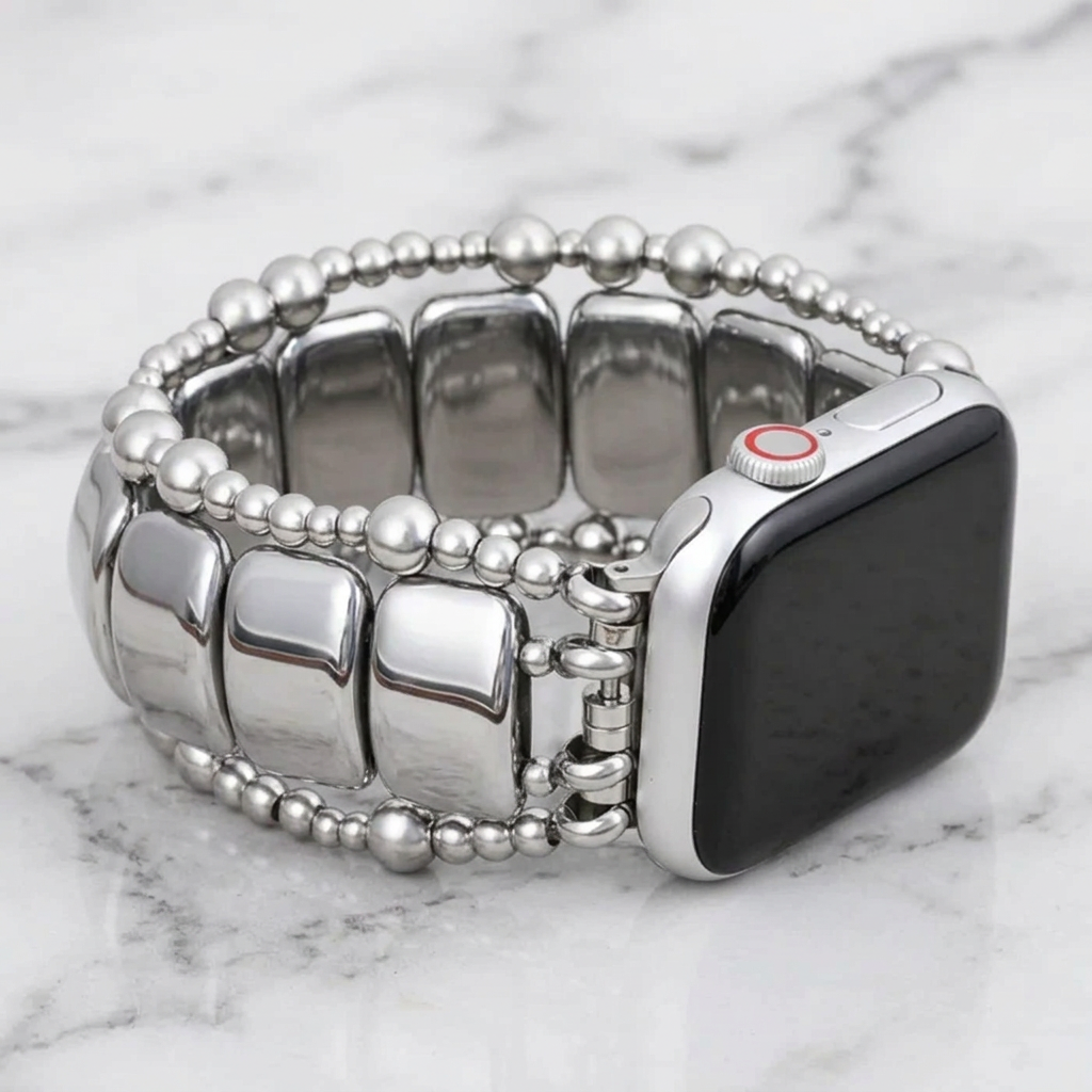 Silver Noir Stretch Apple Watch strap by Cape Diablo, close-up of the flexible, stylish watch band on a silver background.