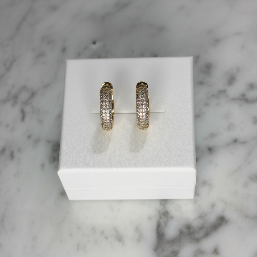 RM 0.8-inch CZ huggie earring with sparkling cubic zirconia stones and a sleek gold-tone finish.